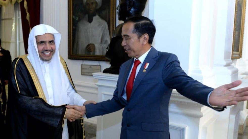 His Excellency the President of the Republic of Indonesia Mr. Joko Widodo welcomes His Excellency Sheikh Dr. Mohammed bin Abdul Karim Al-Issa at the Presidential Palace in the capital of Jakarta