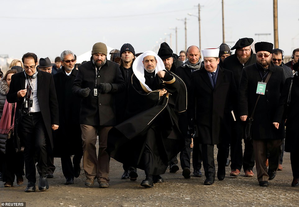 Muslim and Jewish leaders pay 'historic' joint visit to Auschwitz ahead of the 75th anniversary of the death camp's liberation