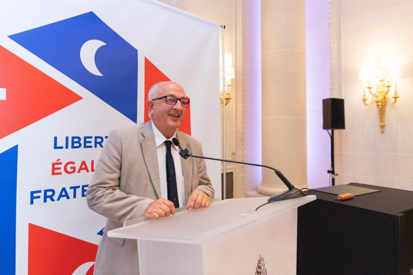 E. Dr. Mohammad Alissa attended the Paris Peace and Solidarity Agreement