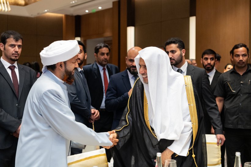 His Excellency Mr. Ajit Doval, National Security Adviser of India, celebrates with His Excellency Sheikh Dr. Muhammad Al-Issa, Secretary General of the Muslim World League
